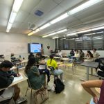 Class photo of Dr. Edu Suarez presenting